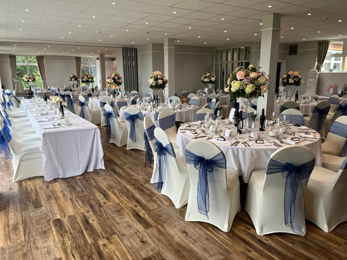 Venue Hire & Events 23 Event Suite with round tables at Brampton Park Golf Club