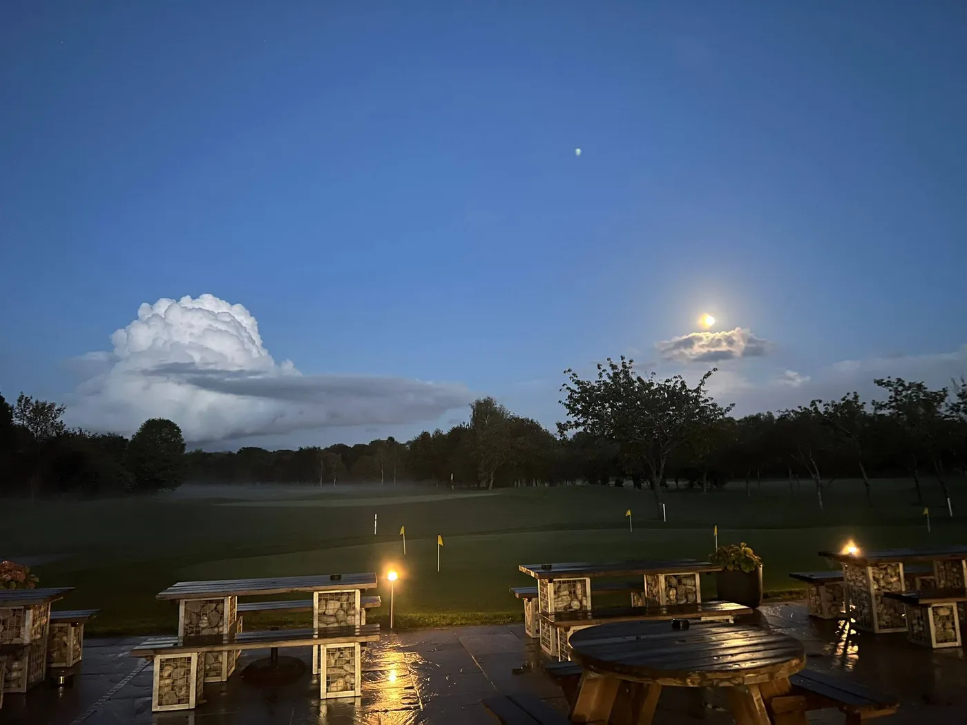 Venue Hire & Events 44 The clubhouse terrace by moonlight at Brampton Park Golf Club