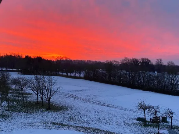 Venue Hire & Events 13 Winter sunset over the snowy course at Brampton Park Golf Club